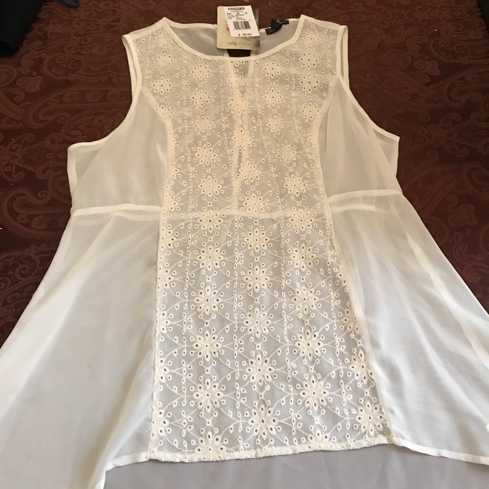 Ivory sheer sleeveless top